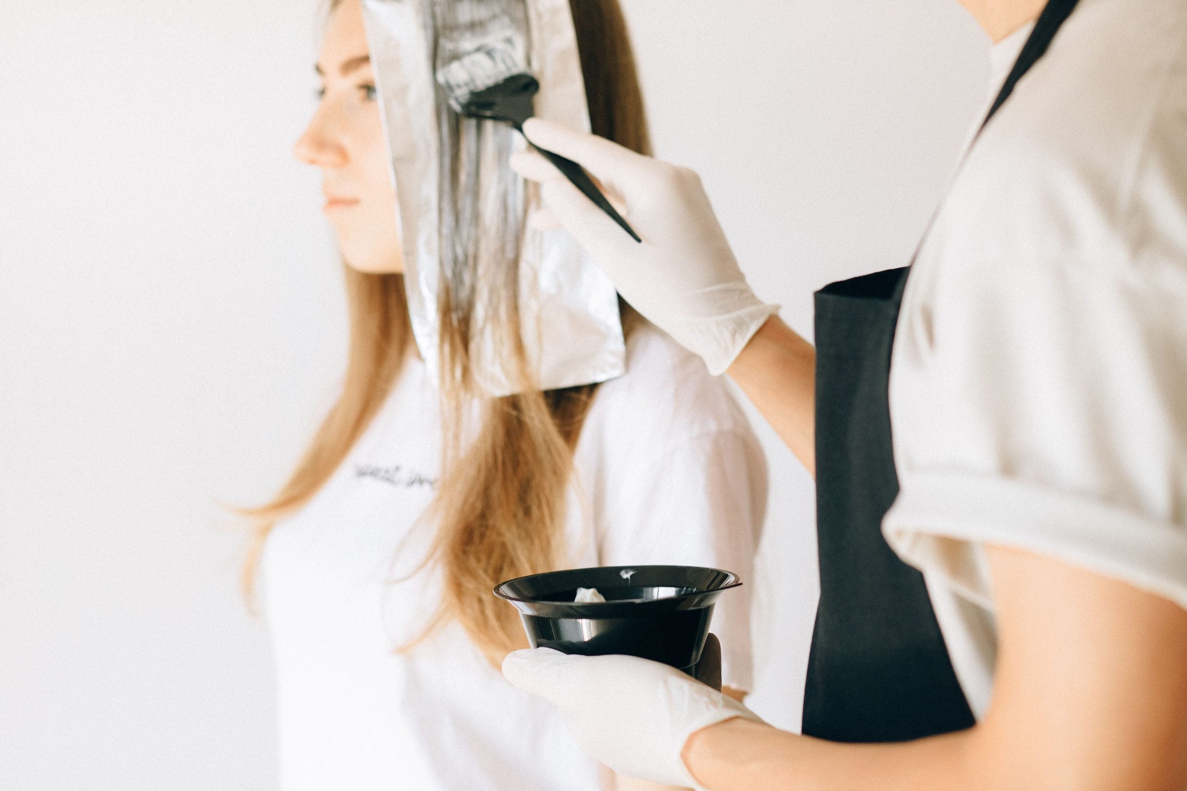 A wet cut being shaped at Silk Hair Lab